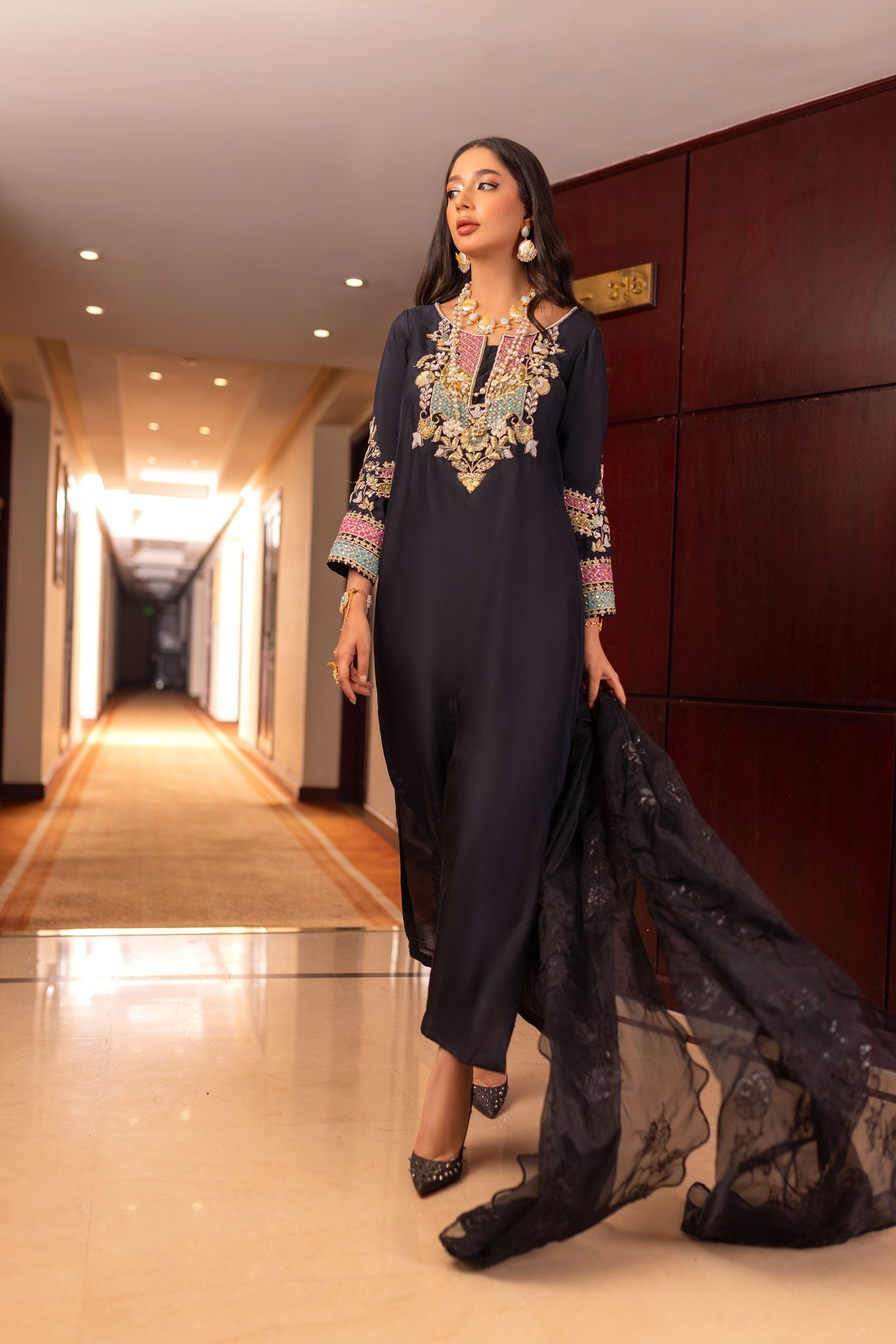 Meraj Black Embroidered Raw Silk Dresses with Organza Dupattas Meraj Black Embroidered Raw Silk Dresses with Organza Dupattas